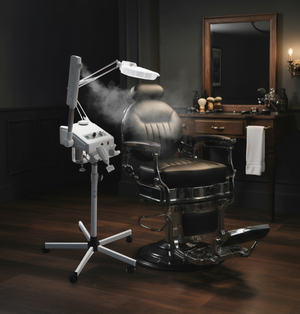 Barber chair with a Skinact Ozone Steamer, 5 Diopter Magnifying Lamp And High Frequency in a dimly lit Barber Studio