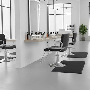 Modern salon interior with black chairs and mirrors and with Rectangular 1/2" Anti Fatigue Beauty Salon Floor Mats